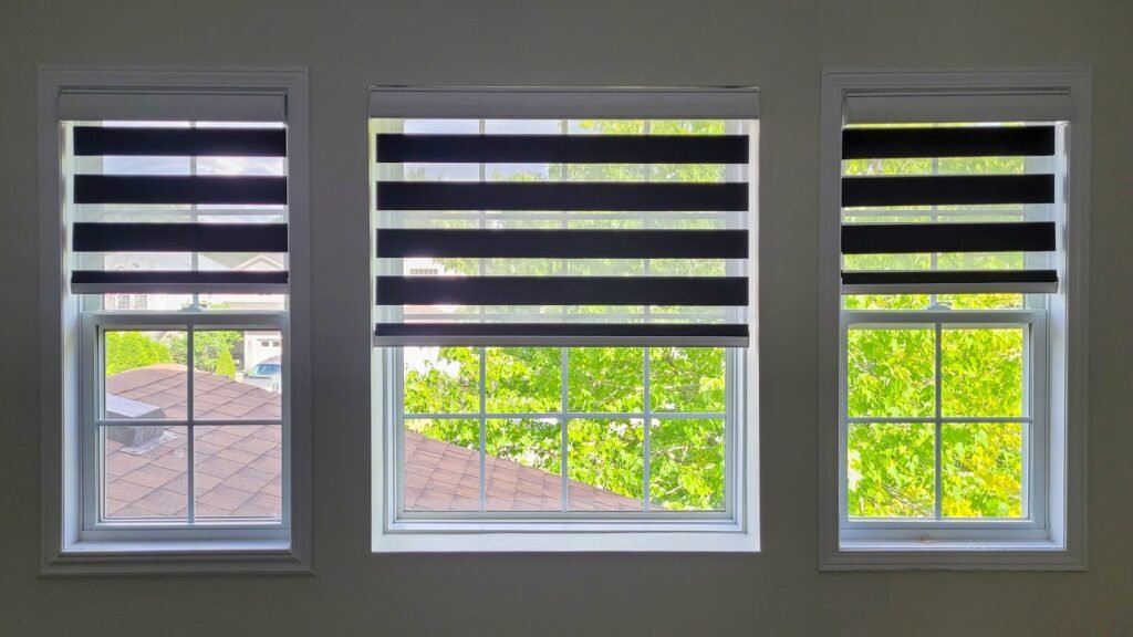 Zebra blinds on three matching windows