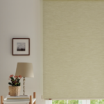 Beige Amos roller shade on a window