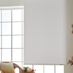 White Bella roller shade on a bright window