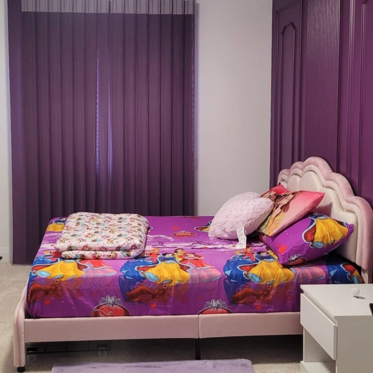 Purple drapery panels in a child’s bedroom