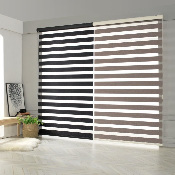 Dark zebra blinds on sliding patio doors in a Canadian home