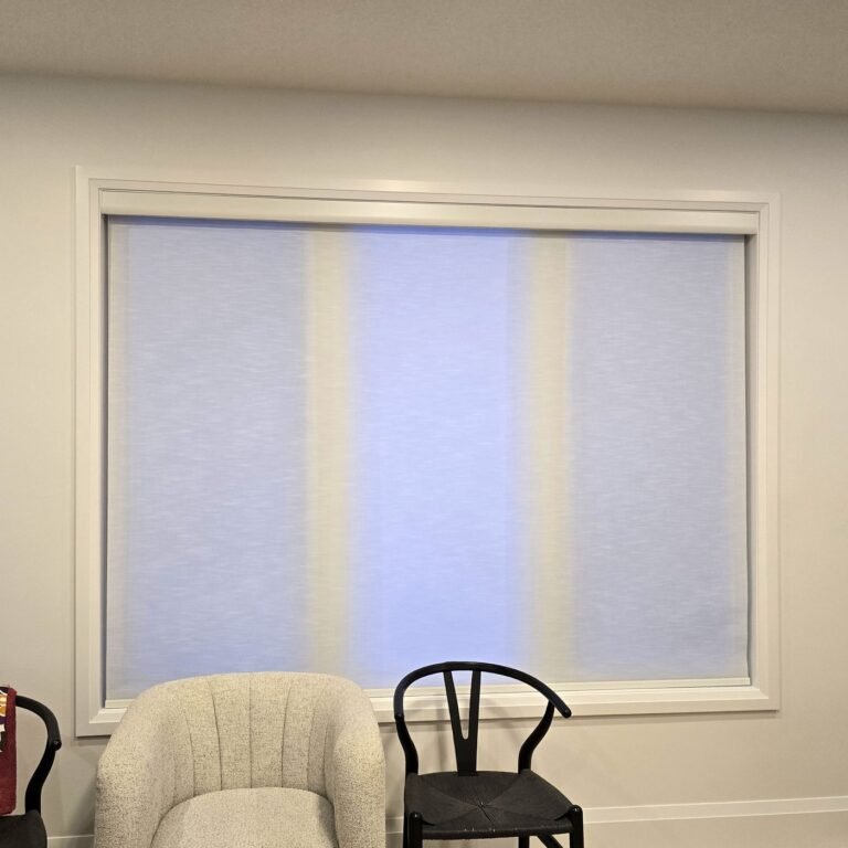 Light-filtering roller shades on living room windows