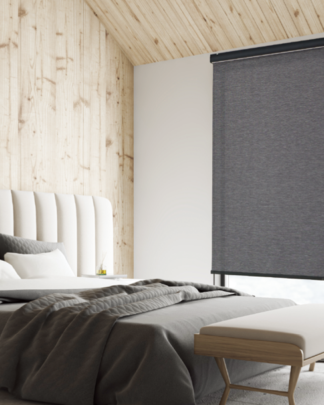 Dark Eco roller shade in a bedroom