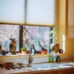 Pleated cellular shade above a kitchen window