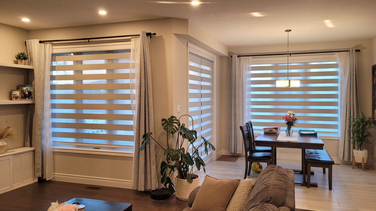 Cachet zebra blinds in a warm living and dining room
