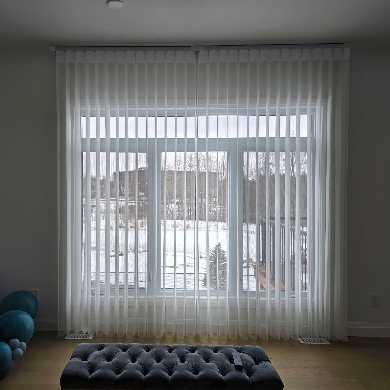 Vertical Sheers — living room installed by Cachet Blinds